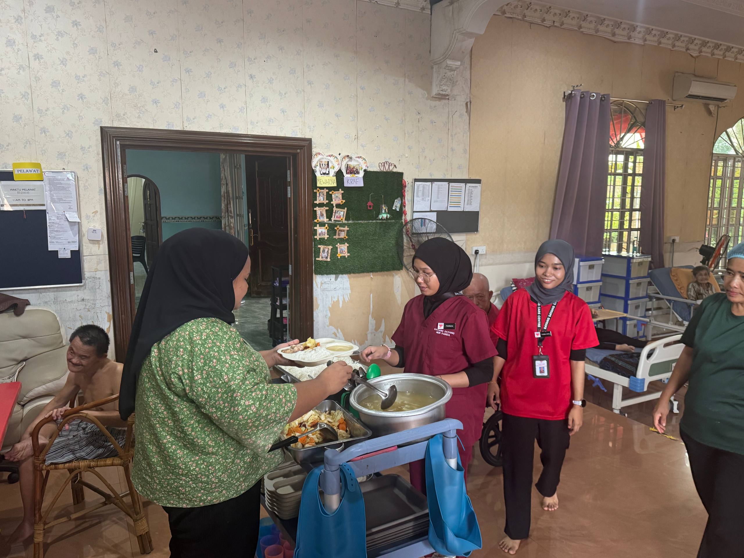 Caregiver preparing and serving food